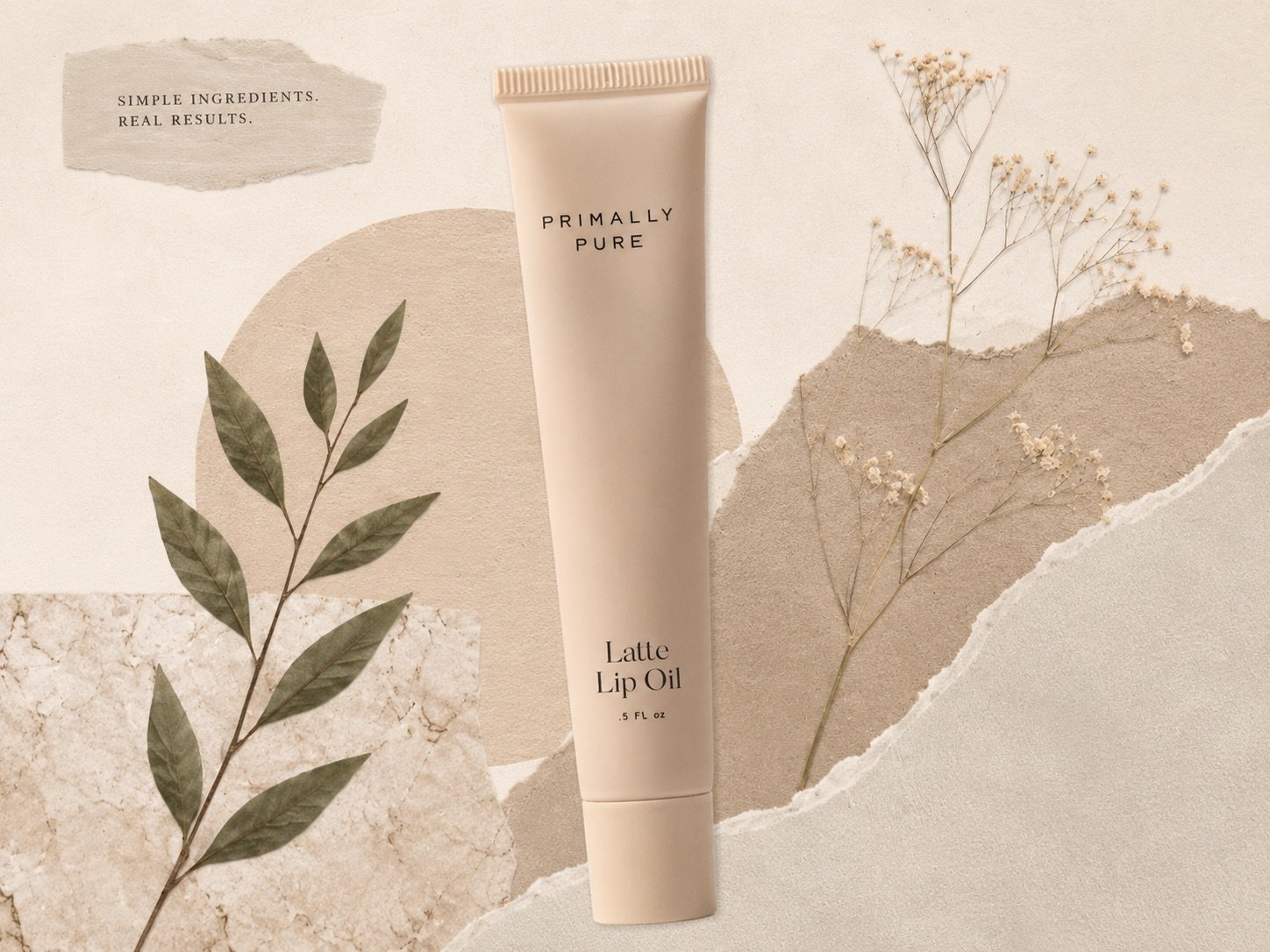 Primally Pure Latte Lip Oil tube in 0.5 fl oz styled with dried flowers and leaves on a minimal beige background